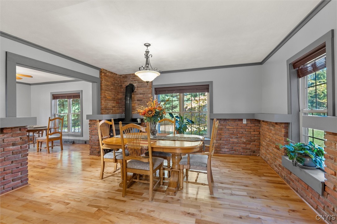 988 County Rte 14 Granby, NY 13069 - Photo 7 of 47 Dining Area-1/2 brick walls