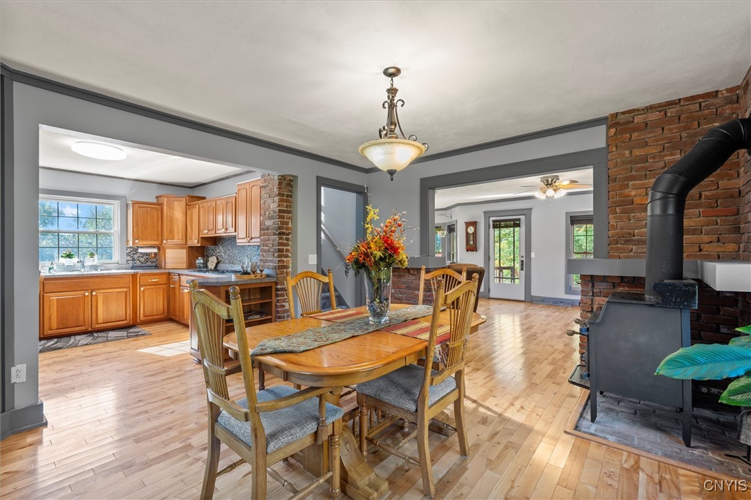 988 County Rte 14 Granby, NY 13069 - Photo 9 of 47 Dining Area/w woodstove