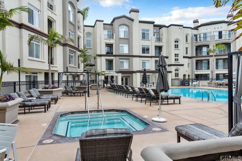 9253 Regents Road, Unit A203 San Diego, CA 92037 - Photo 25 of 38 a building view with sitting space and seating area