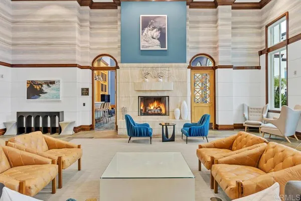 a living room with furniture or fireplace and a potted plant