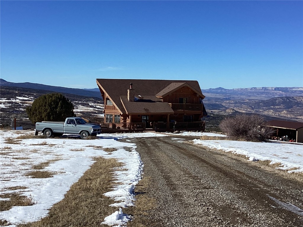 9073 54 7/10 Road Molina, CO 81646 - Photo 2 of 38 View of front of home with a mountain view