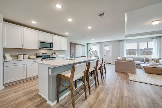 a living room with furniture and a table