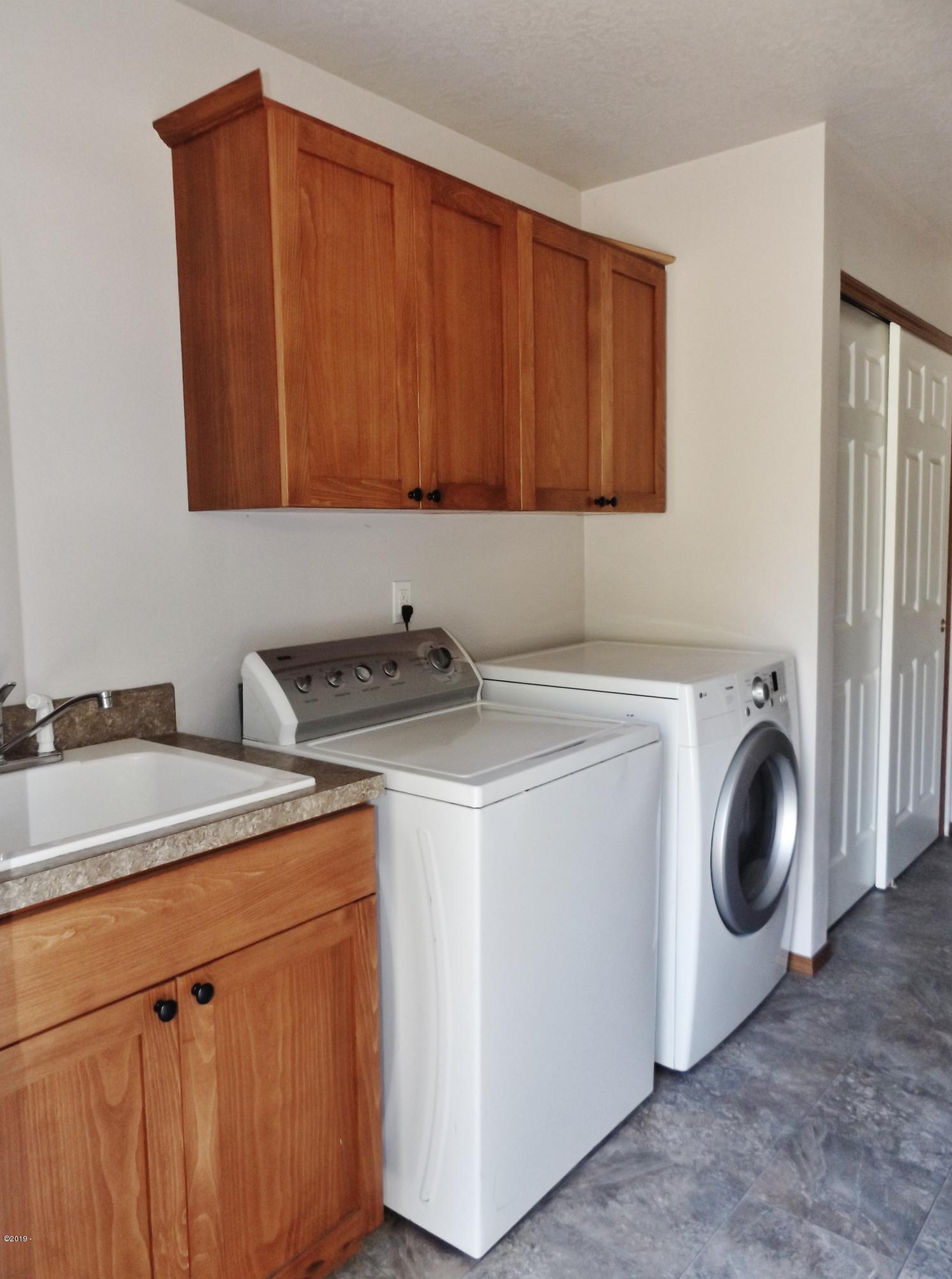 353 East Darkey Creek Road Waldport, OR 97394 - Photo 32 of 35 Laundry Room