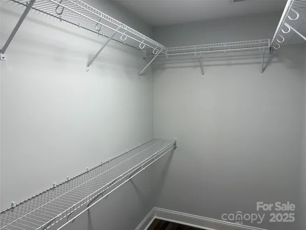 a view of a room with racks on the wall