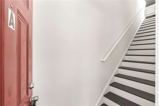 a view of entryway with stairs