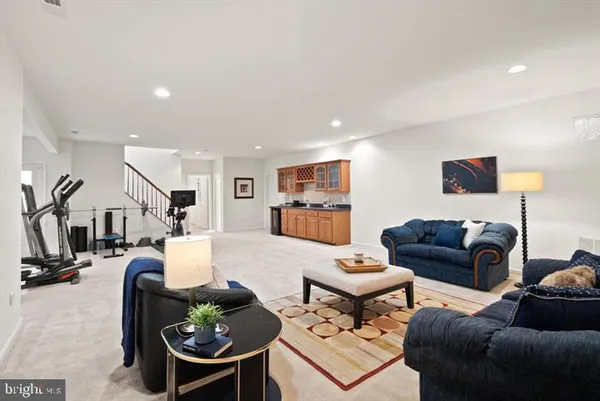 a living room with furniture and a table