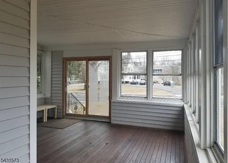 358 Woodland Road, Unit 2 Madison, NJ 07940 - Photo 31 of 50 a view of a room with wooden floor and windows