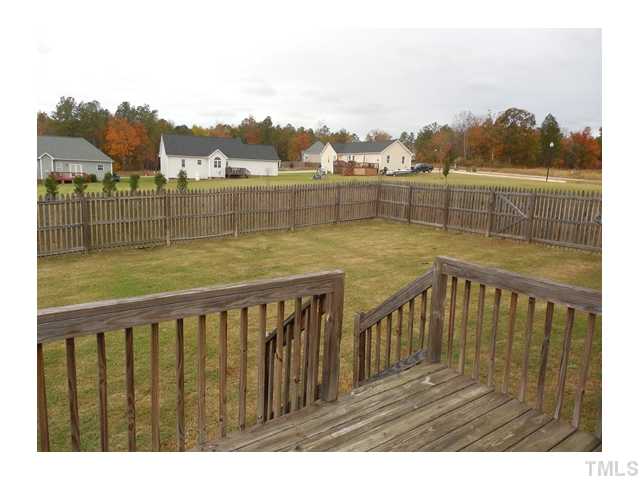 72 Hunters Point Court Angier, NC 27501 - Photo 10 of 10 back deck and fenced in back yard