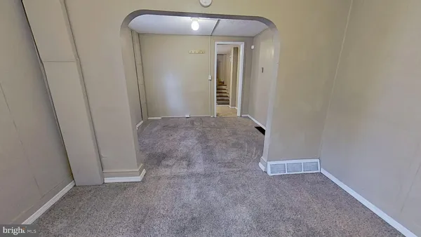 a view of a room with an empty space