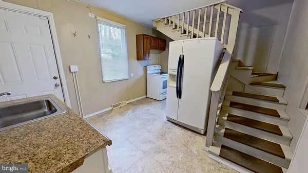 a view of a storage and utility room