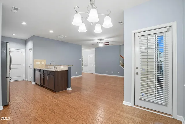 a view of a kitchen with a sink