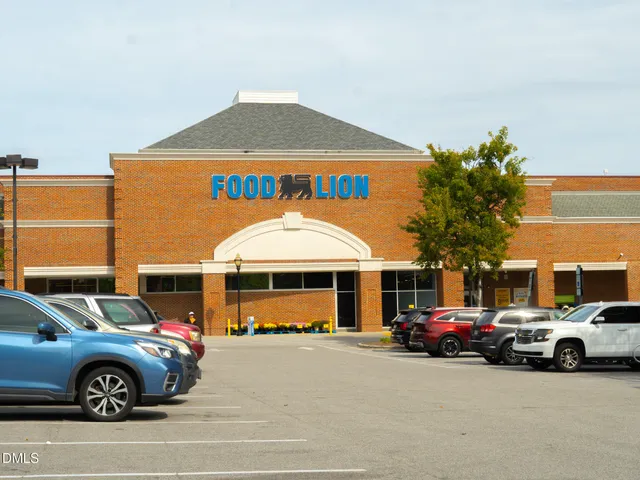 a view of street with parked cars