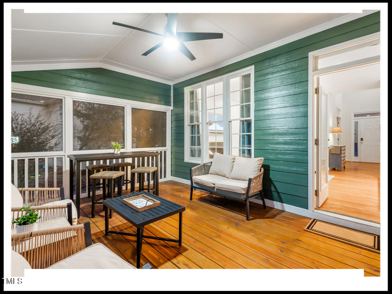 8214 Morrell Lane Durham, NC 27713 - Photo 19 of 48 a balcony with furniture and a potted plant