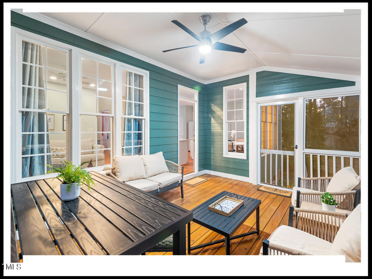 8214 Morrell Lane Durham, NC 27713 - Photo 20 of 48 a living room with furniture and a large window