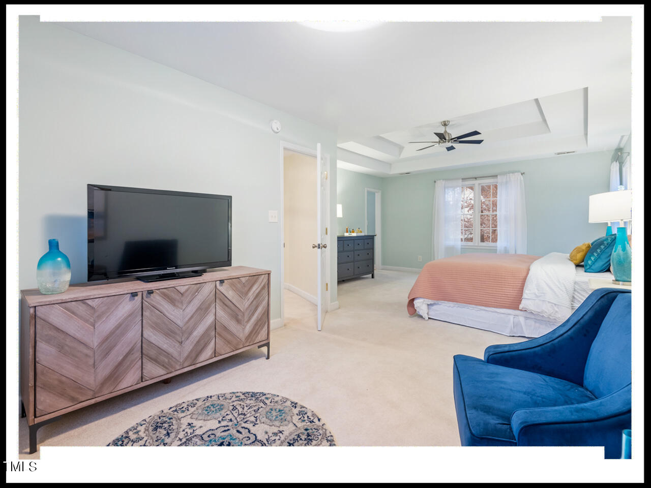 8214 Morrell Lane Durham, NC 27713 - Photo 26 of 48 a living room with furniture and a flat screen tv