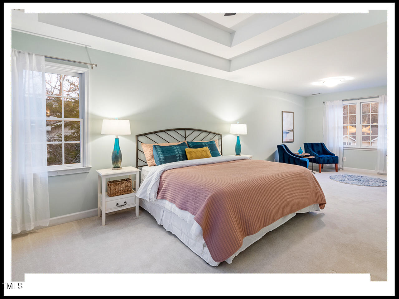 8214 Morrell Lane Durham, NC 27713 - Photo 27 of 48 a bedroom with a bed and a large window