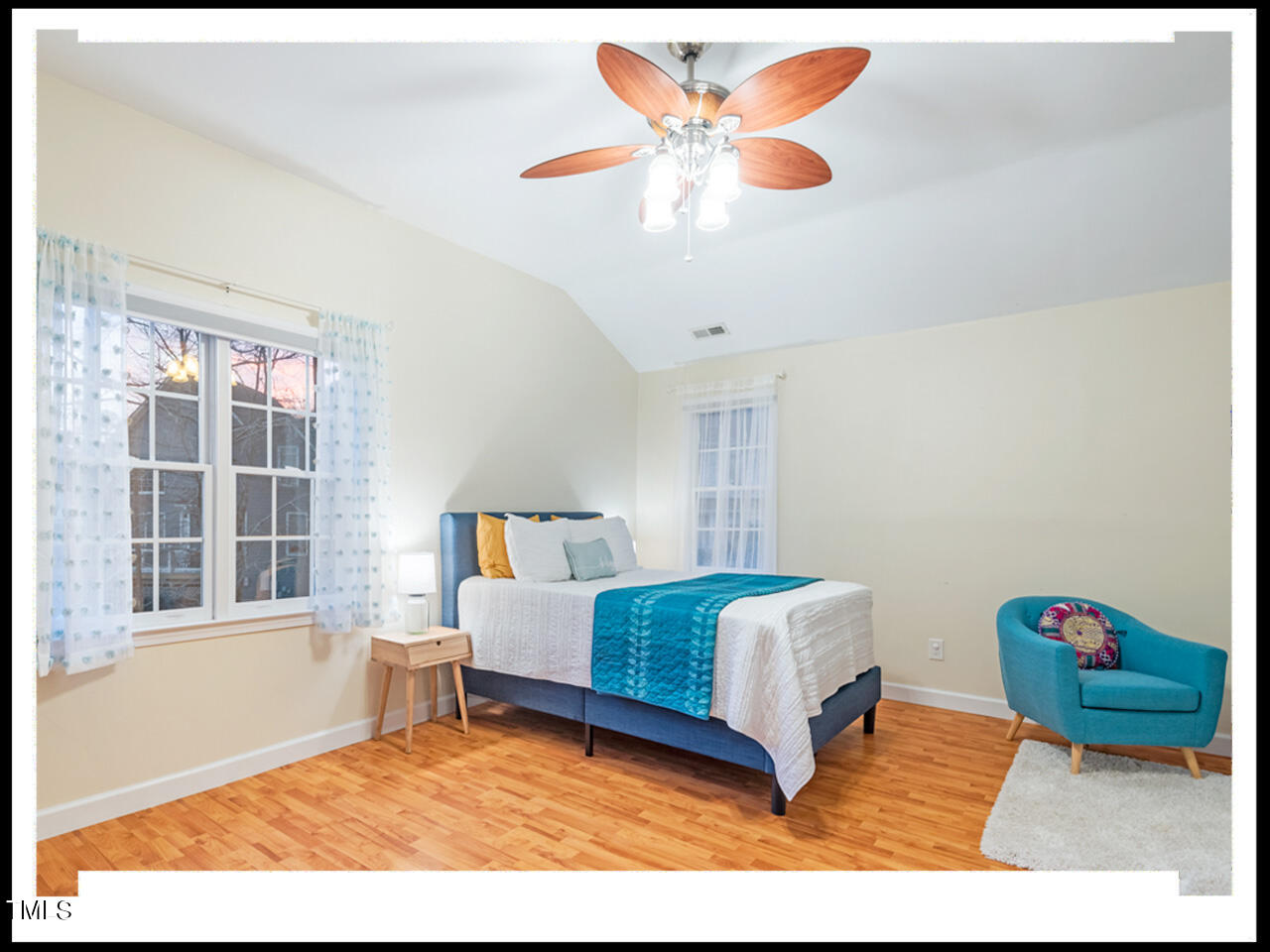 8214 Morrell Lane Durham, NC 27713 - Photo 32 of 48 a bedroom with furniture and a large window