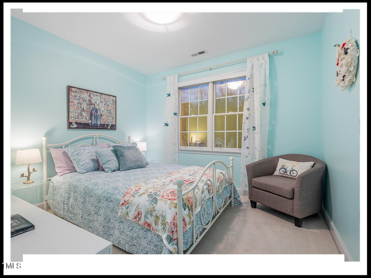 8214 Morrell Lane Durham, NC 27713 - Photo 40 of 48 a bedroom with a bed and a couch