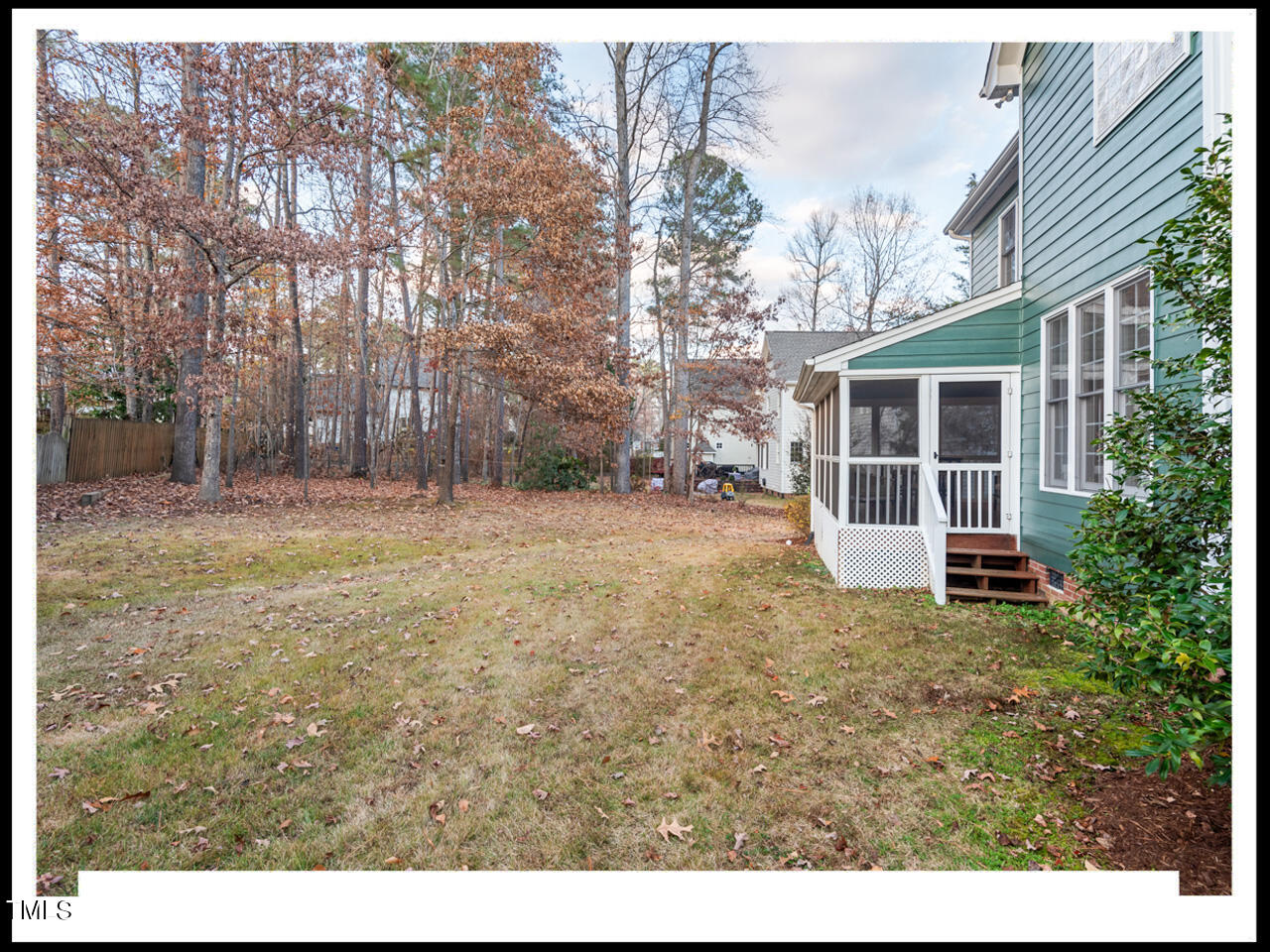 8214 Morrell Lane Durham, NC 27713 - Photo 43 of 48 a view of a house with a yard