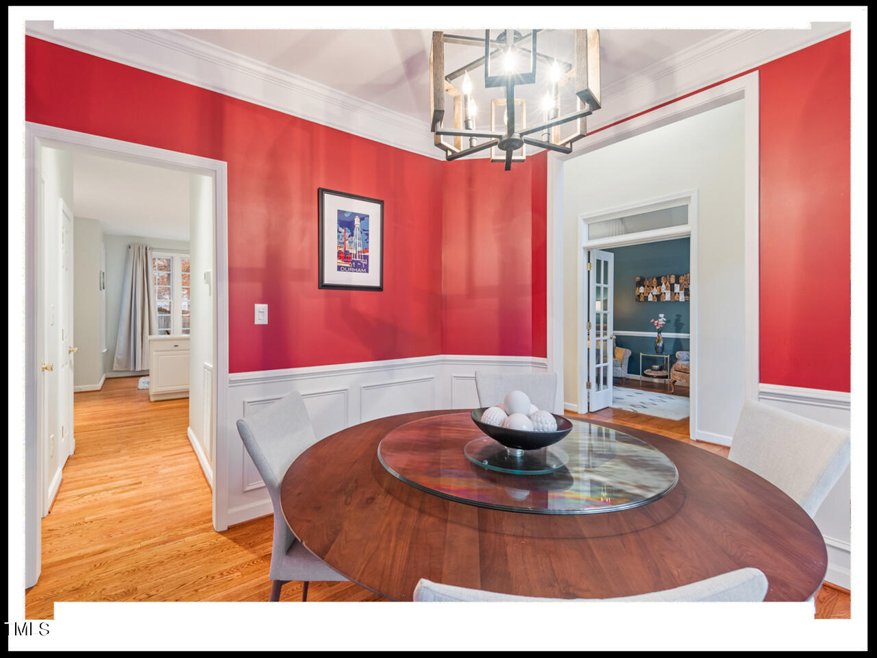 8214 Morrell Lane Durham, NC 27713 - Photo 6 of 48 a room with furniture and a chandelier