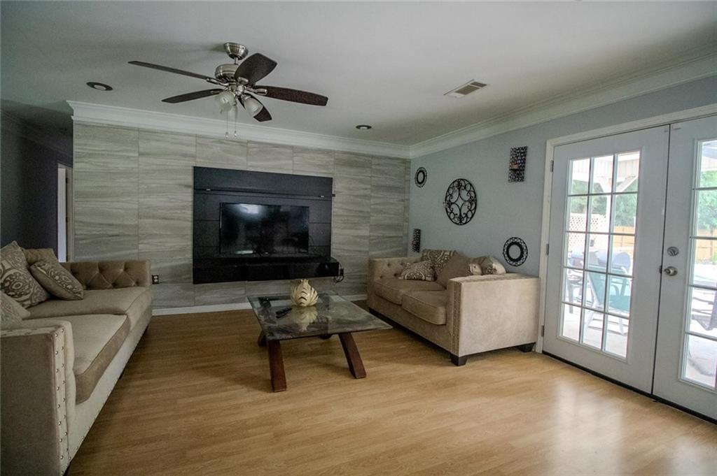 4184 Red Laurel Way Southwest Snellville, GA 30039 - Photo 15 of 35 a living room with furniture and a fireplace