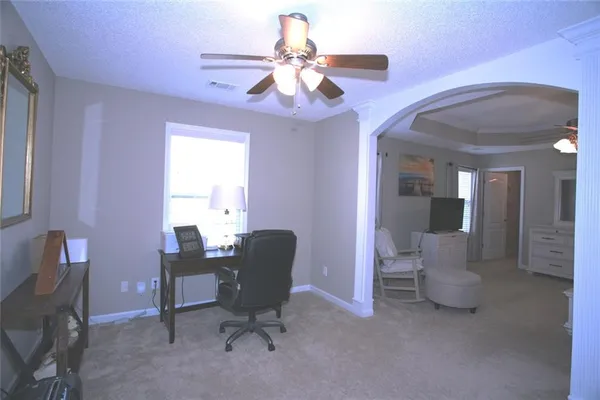 a workspace with chandelier