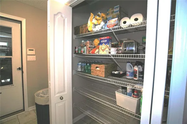 a closeup of a storage and utility room