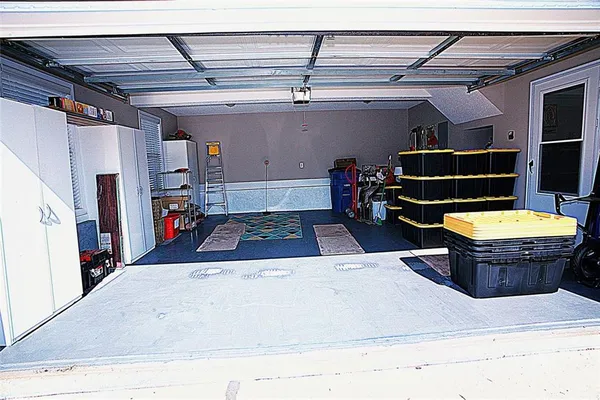 a room with lots of furniture and clutter