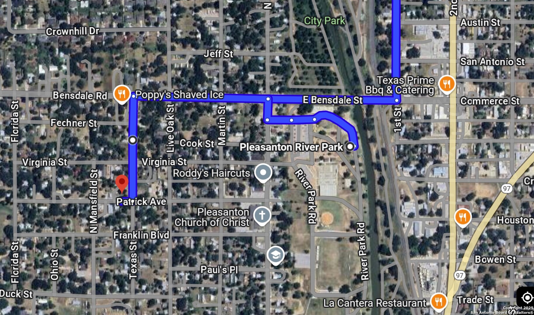 406 Patrick Avenue Pleasanton, TX 78064 - Photo 17 of 18 a city street filled with lots of tall buildings