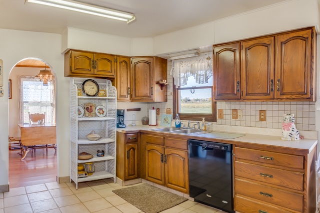 3476 F Road Clifton, CO 81520 - Photo 15 of 29 a kitchen with stainless steel appliances granite countertop a sink dishwasher stove and cabinets