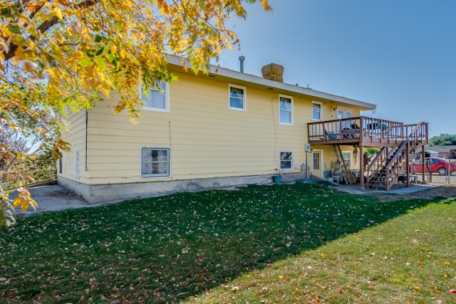 3476 F Road Clifton, CO 81520 - Photo 6 of 29 a front view of house with yard