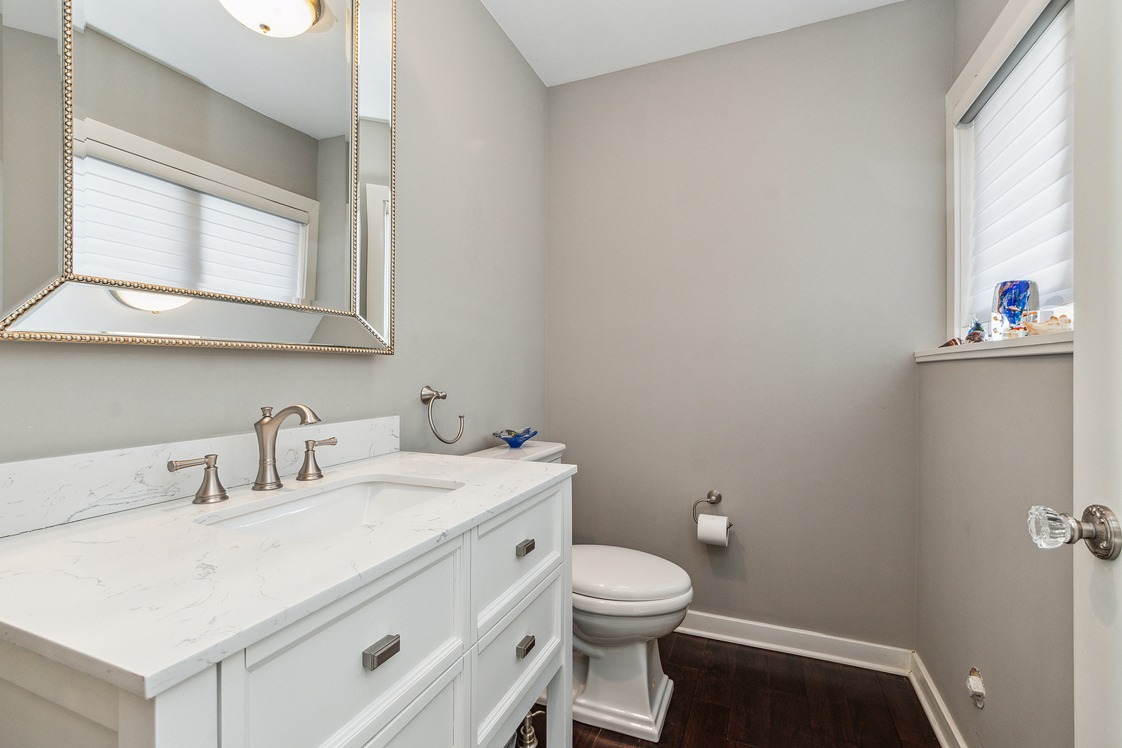 305 North Reed Street Joliet, IL 60435 - Photo 22 of 62 a bathroom with a toilet sink and mirror