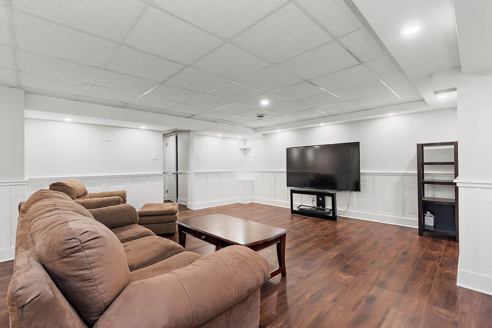 305 North Reed Street Joliet, IL 60435 - Photo 42 of 62 a living room with furniture and a flat screen tv