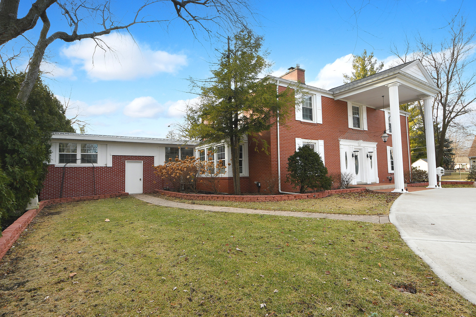 305 North Reed Street Joliet, IL 60435 - Photo 47 of 62 a view of a house with a patio