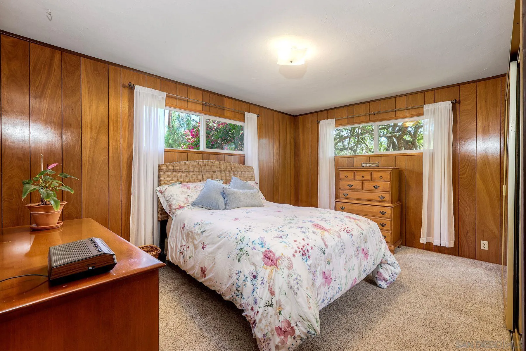 15525 Lyons Valley Road Jamul, CA 91935 - Photo 24 of 53 a bedroom with a bed and large windows
