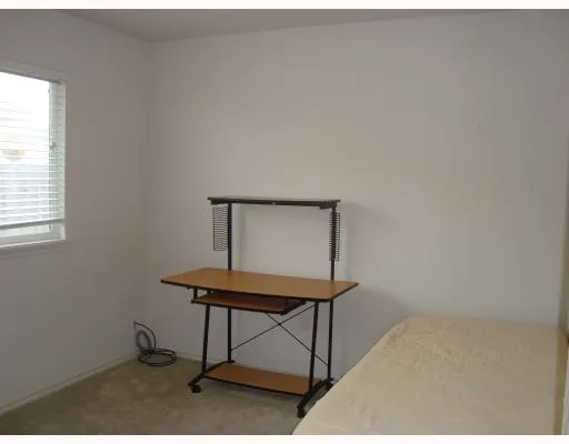 a room with a table and a window