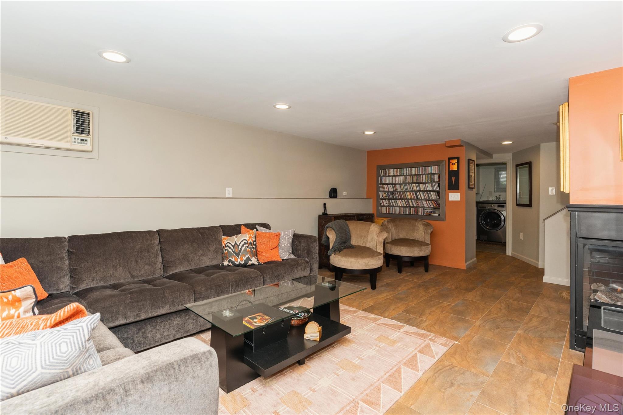 2772 Riverside Avenue Merrick, NY 11566 - Photo 19 of 45 a living room with furniture and a wooden floor