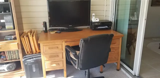 a view of workspace with mirror