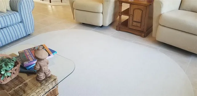 a view of a livingroom with furniture and a couch