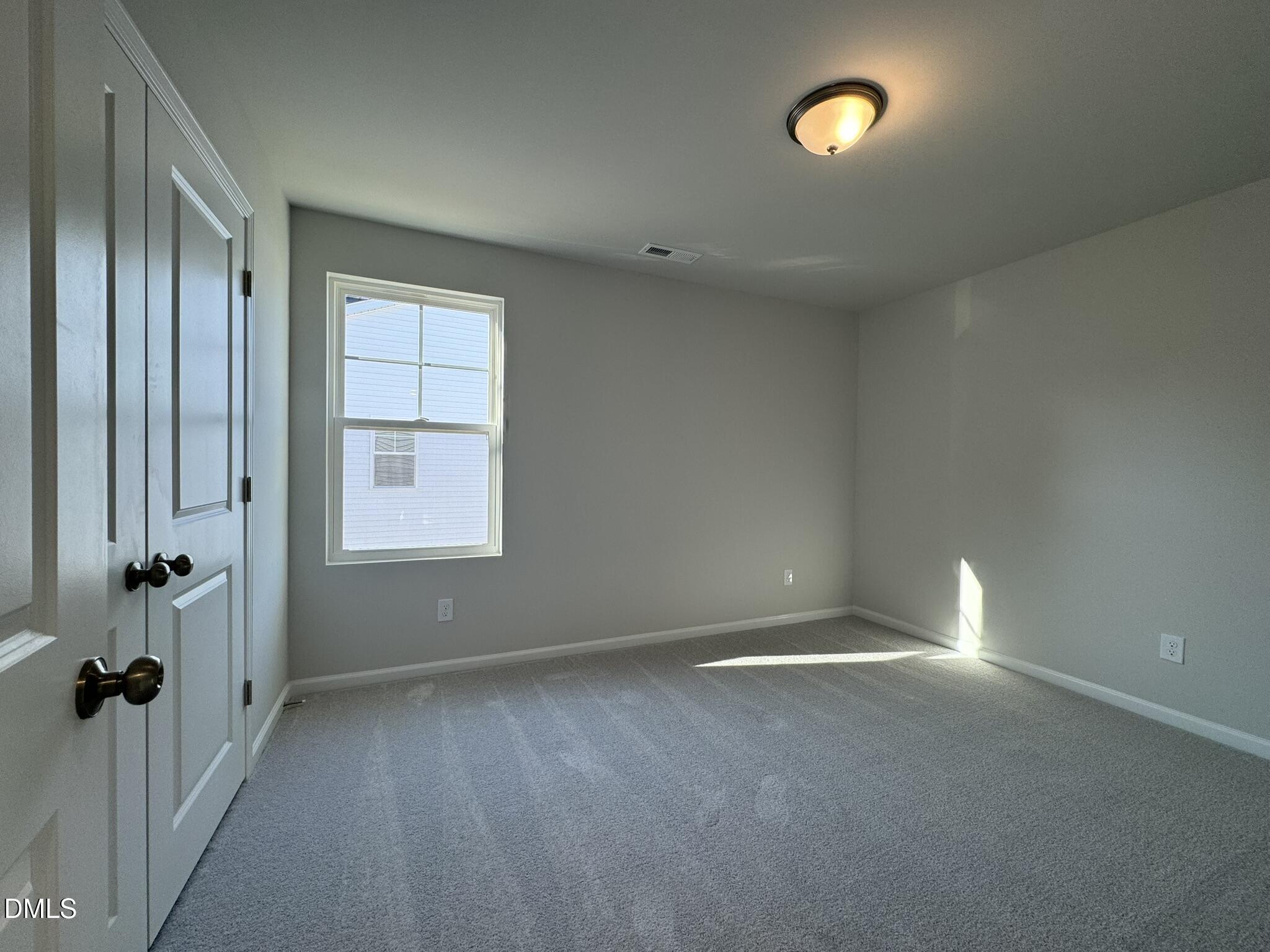 2509 Salt River Lane Raleigh, NC 27616 - Photo 32 of 34 wooden floor and windows in an empty room
