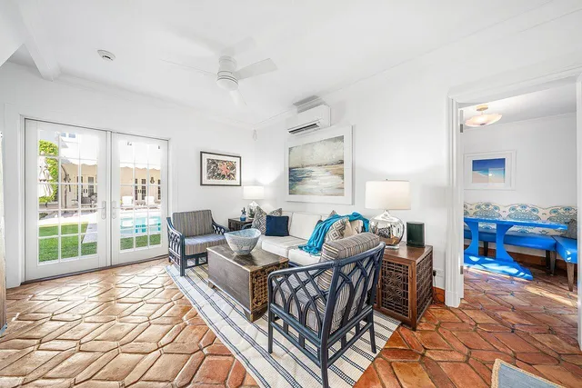 a bathroom with a sink toilet a mirror and shower