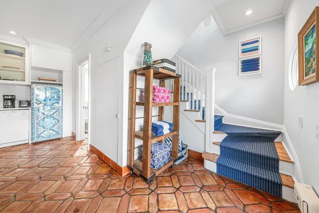 a bedroom with double bed and a window