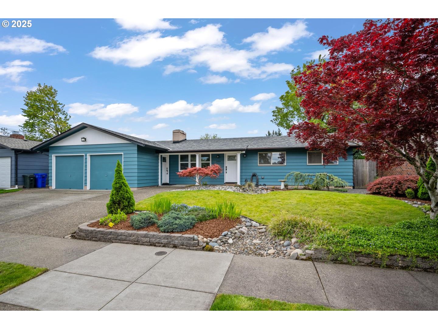 2000 Northwest 7th Place Gresham, OR 97030 - Photo 1 of 34 a front view of a house with a yard and garage