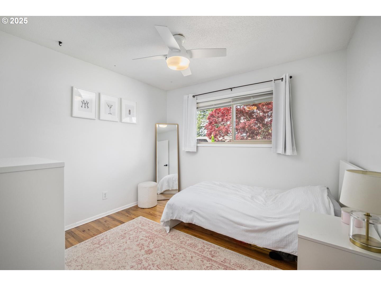 2000 Northwest 7th Place Gresham, OR 97030 - Photo 18 of 34 a bedroom with a bed and a painting on the wall
