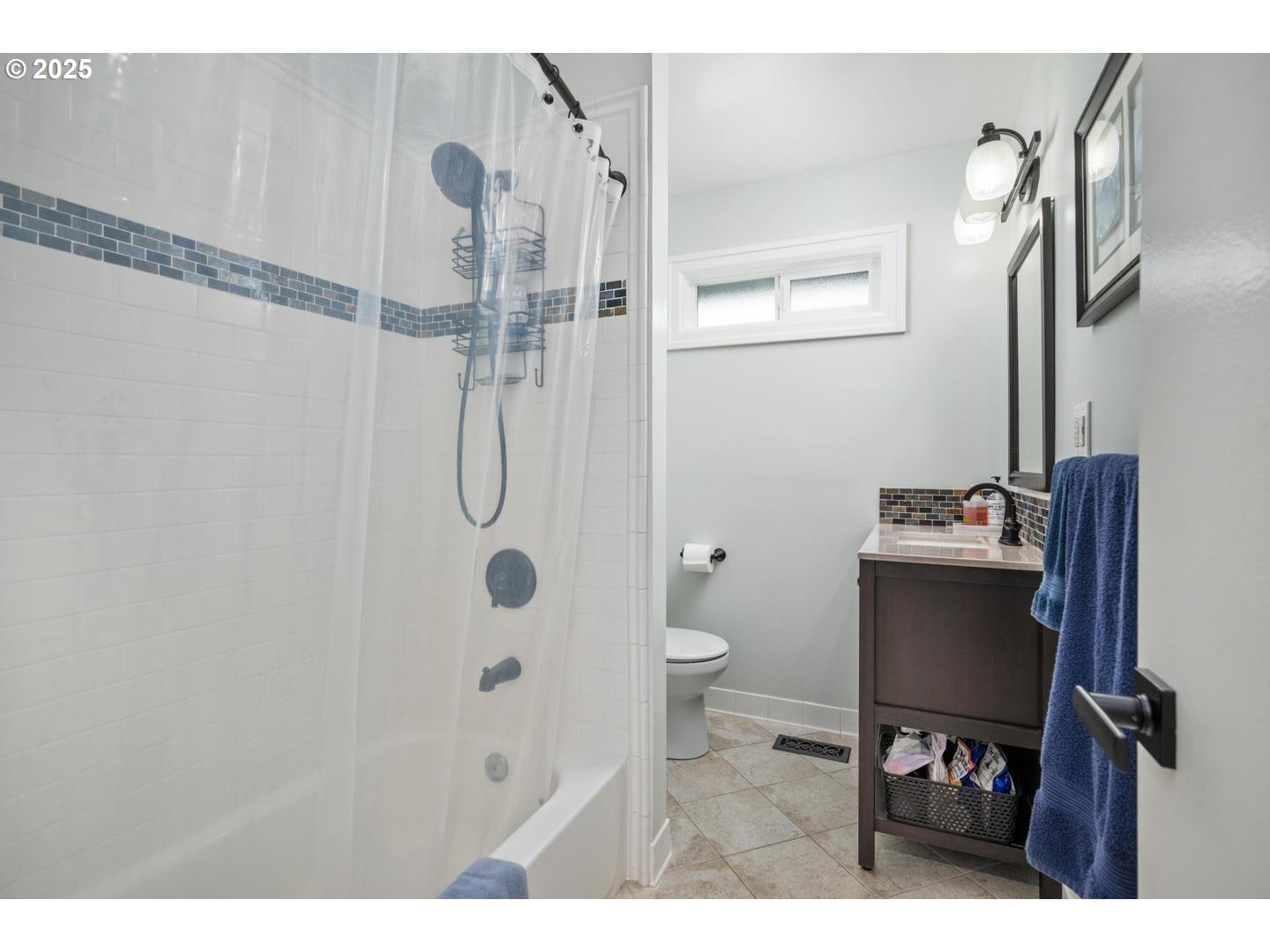 2000 Northwest 7th Place Gresham, OR 97030 - Photo 21 of 34 a bathroom with a granite countertop sink a toilet and a mirror
