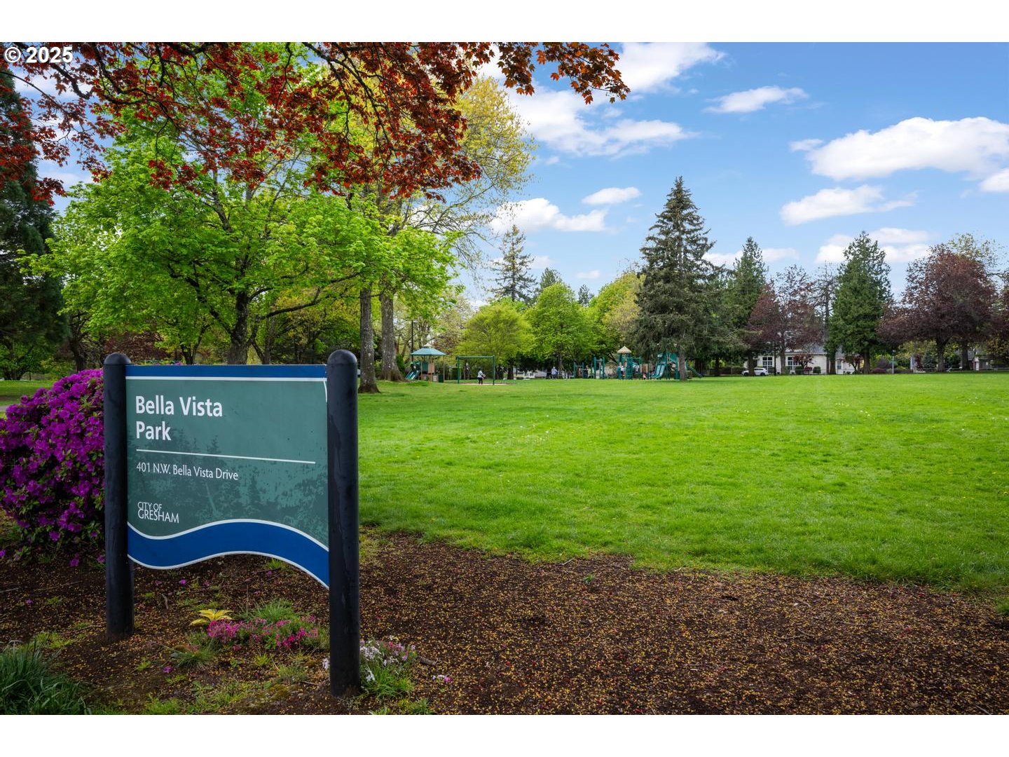 2000 Northwest 7th Place Gresham, OR 97030 - Photo 30 of 34 a wooden fence with some trees in the background