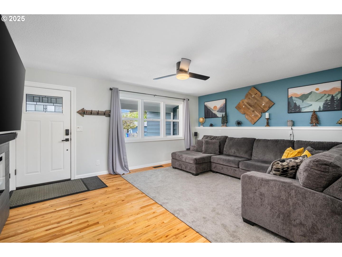2000 Northwest 7th Place Gresham, OR 97030 - Photo 4 of 34 a living room with furniture and wooden floor