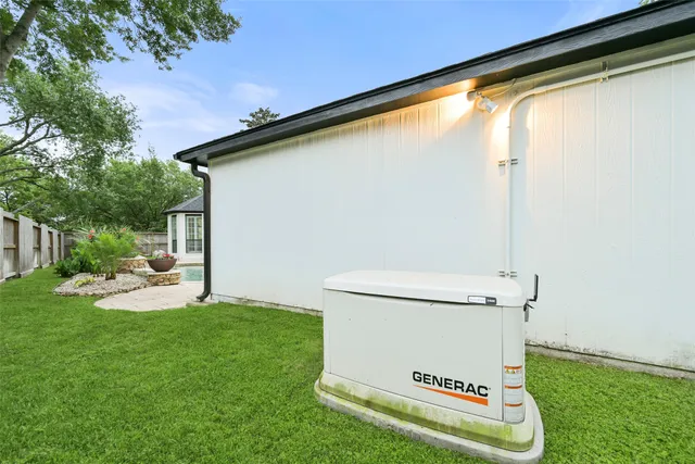 a view of a back yard of the house