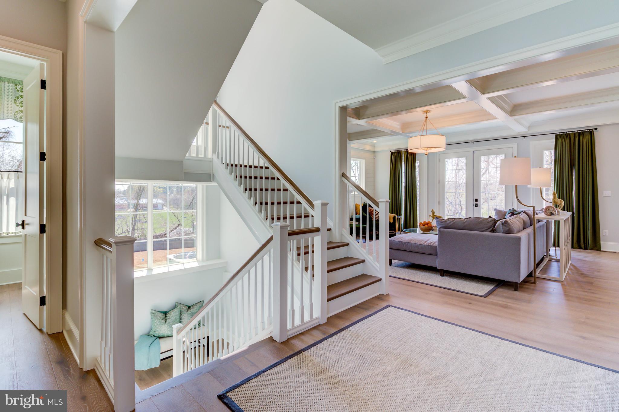 39 Old Covered Bridge Road Newtown Square, PA 19073 - Photo 4 of 19 a living room with furniture and a chandelier