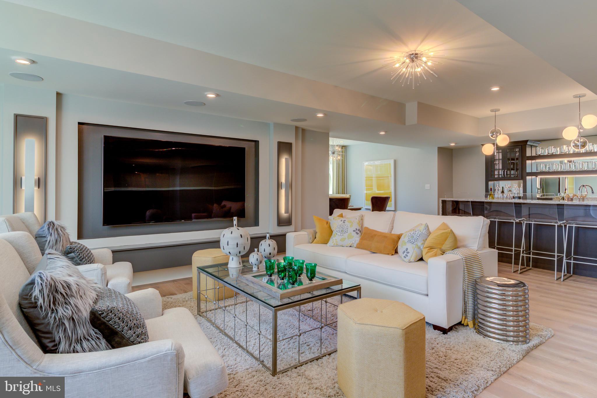 39 Old Covered Bridge Road Newtown Square, PA 19073 - Photo 5 of 19 a living room with furniture and a flat screen tv